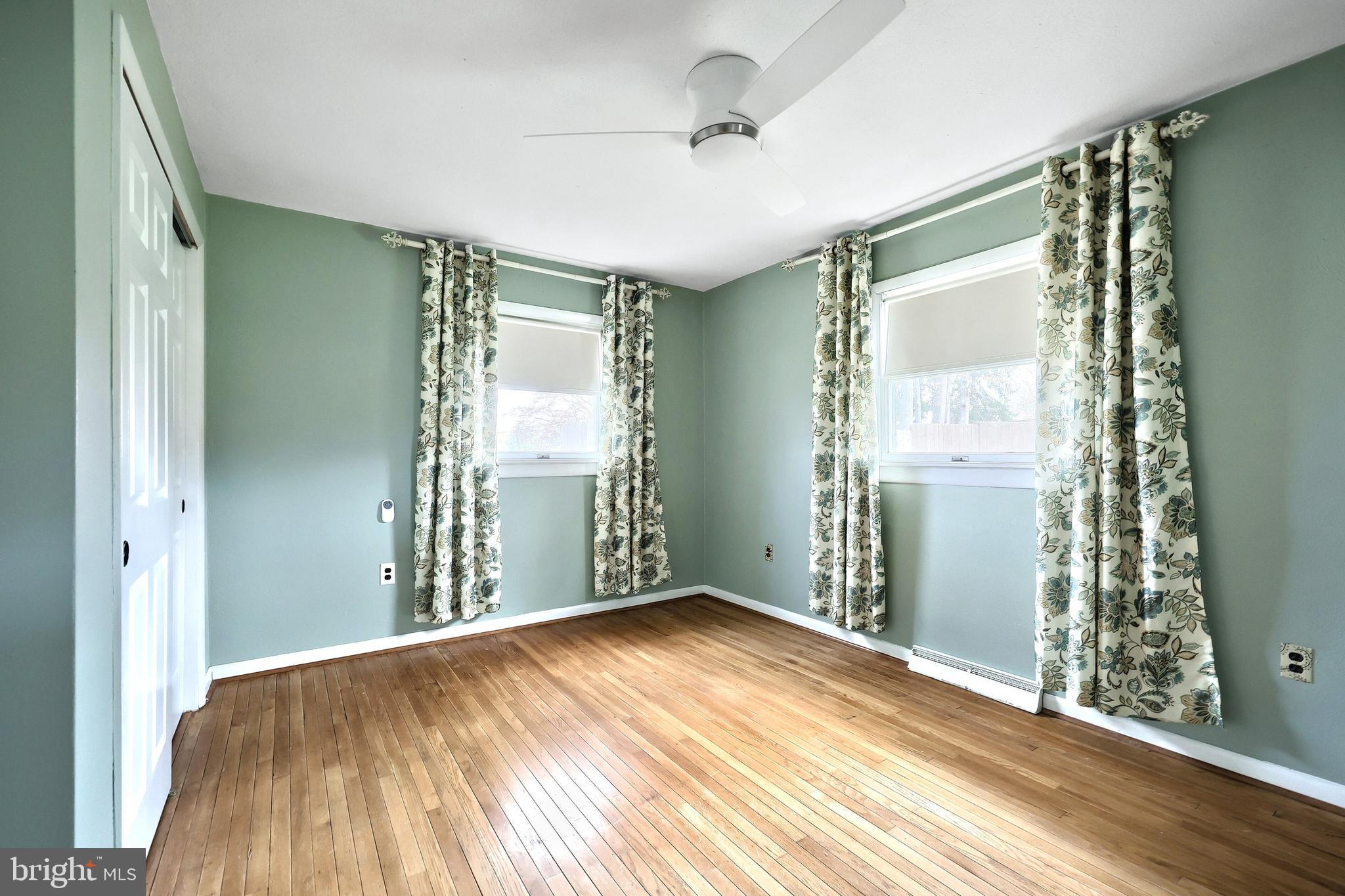 13 Circle Drive Jacobus, PA 17407 - Photo 14 of 53 a view of empty room with window and wooden floor
