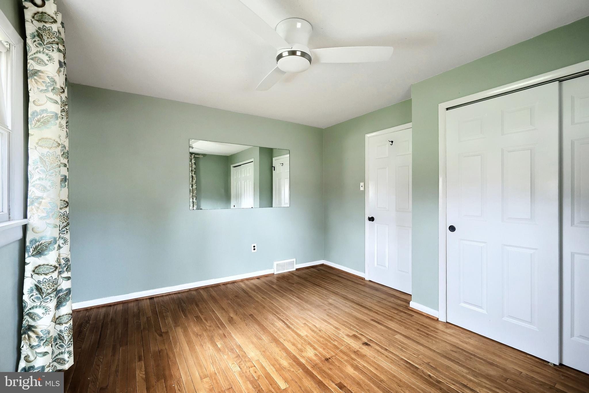 13 Circle Drive Jacobus, PA 17407 - Photo 15 of 53 a view of empty room with wooden floor and fan