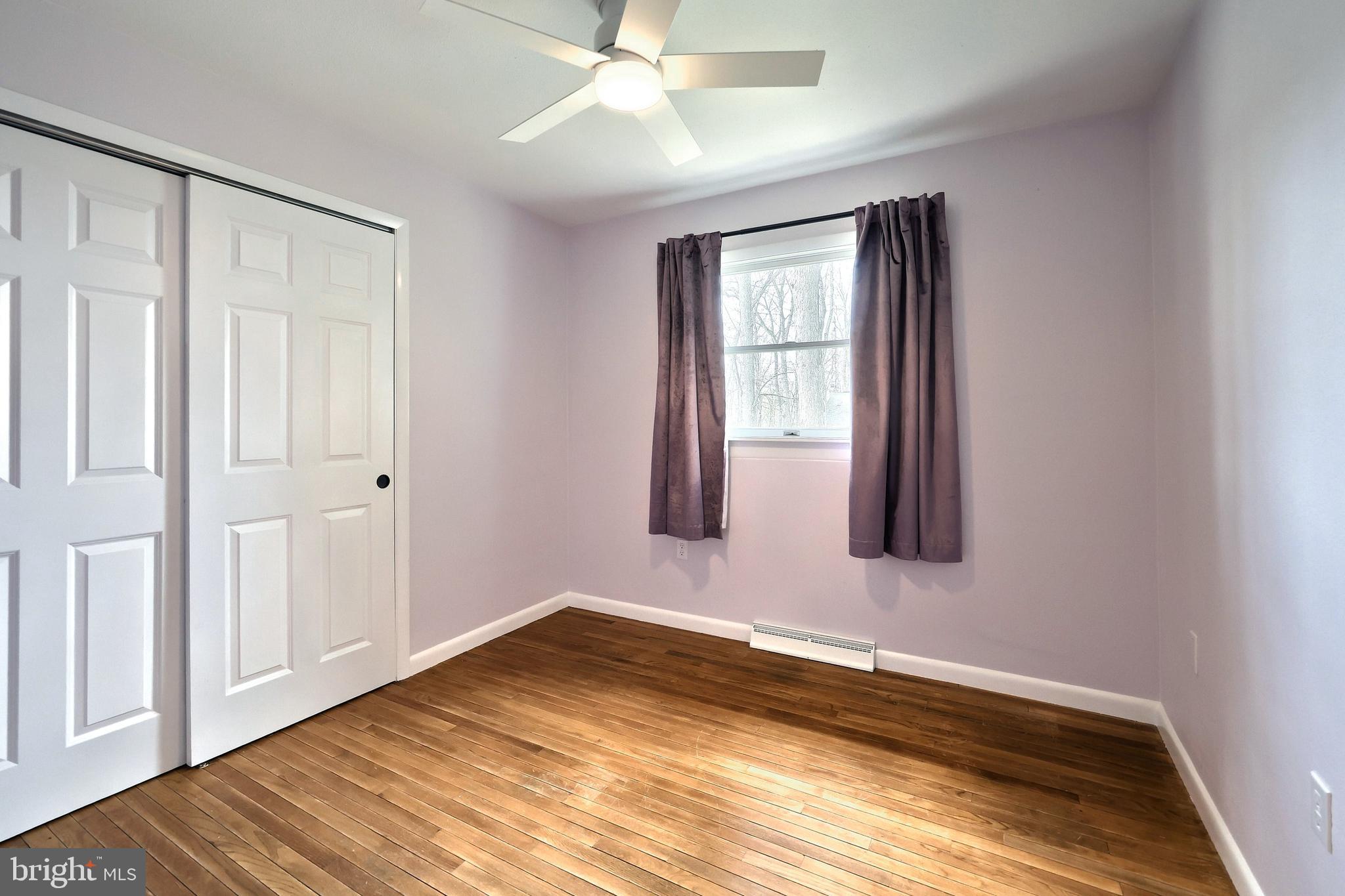 13 Circle Drive Jacobus, PA 17407 - Photo 16 of 53 wooden floor in an empty room with a window