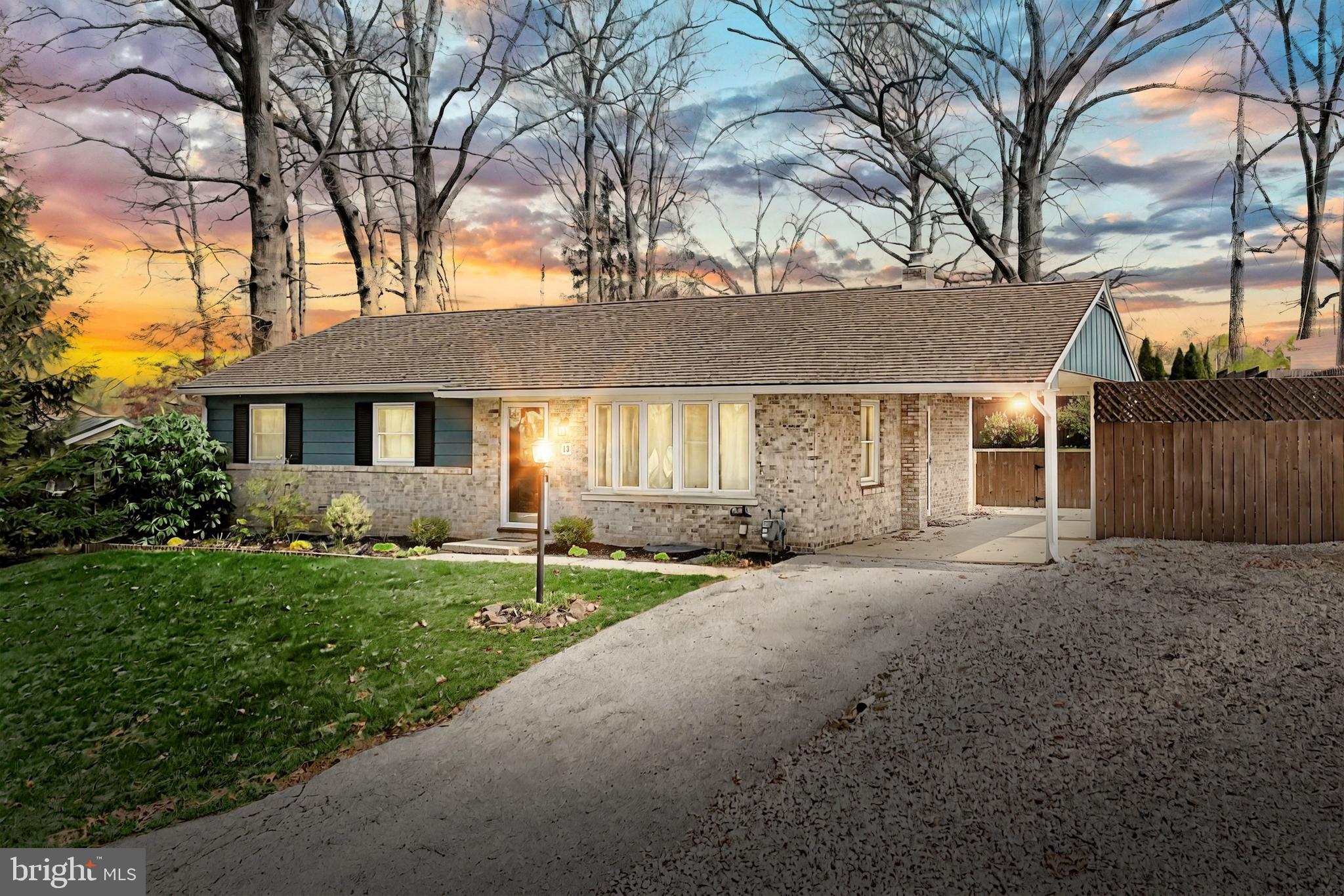 13 Circle Drive Jacobus, PA 17407 - Photo 2 of 53 a front view of a house with a garden and trees