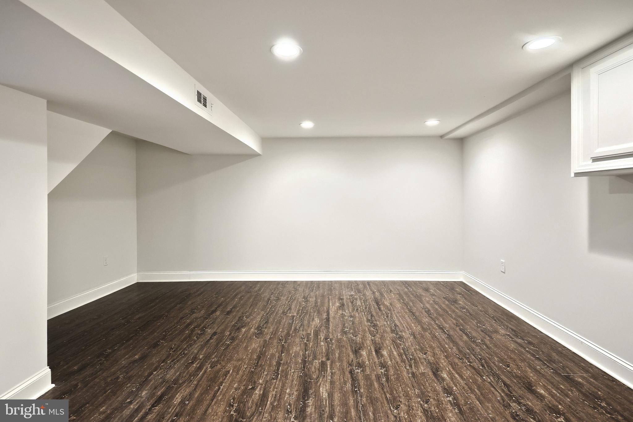 13 Circle Drive Jacobus, PA 17407 - Photo 24 of 53 an empty room with wooden floor and windows