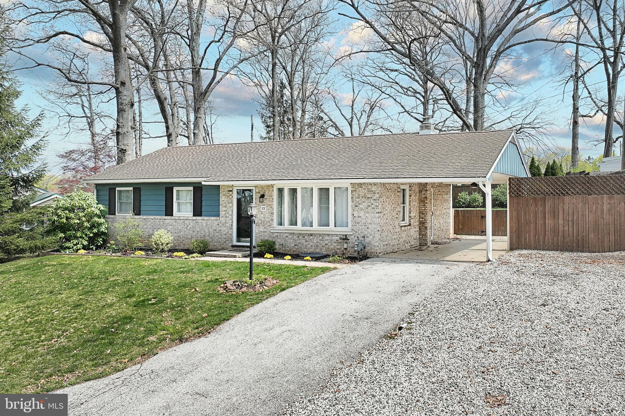 13 Circle Drive Jacobus, PA 17407 - Photo 34 of 53 a front view of a house with a garden and trees