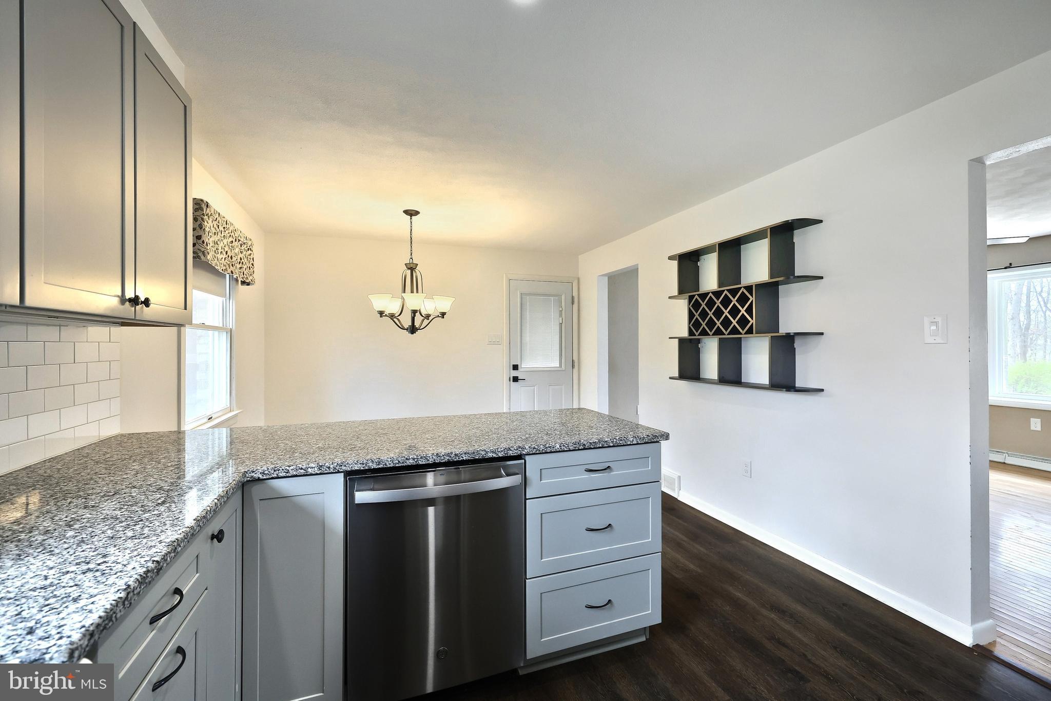 13 Circle Drive Jacobus, PA 17407 - Photo 9 of 53 a bathroom with a granite countertop sink and a mirror