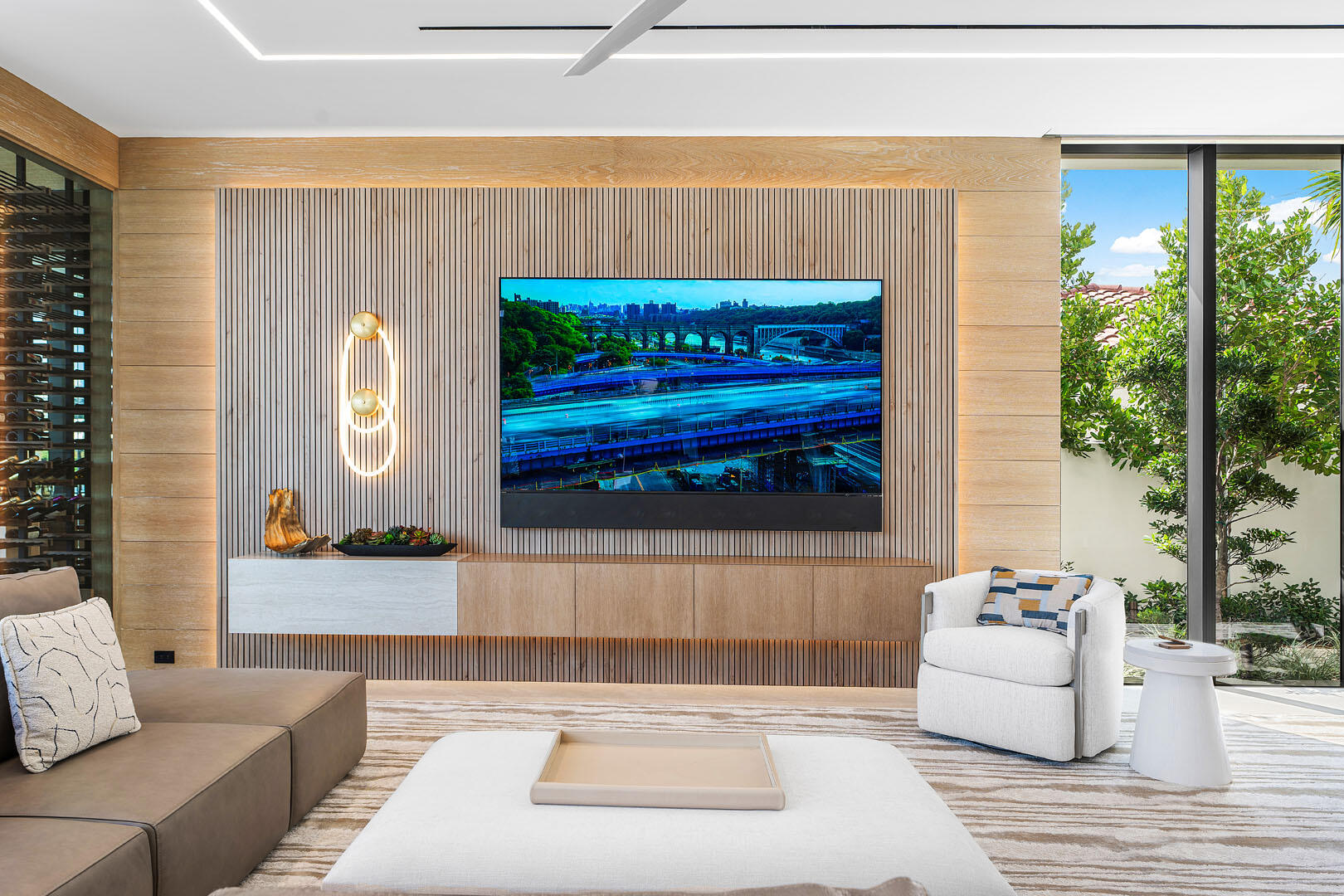 1520 Royal Palm Way Boca Raton, FL 33432 - Photo 34 of 100 a living room with a couch and a potted plant