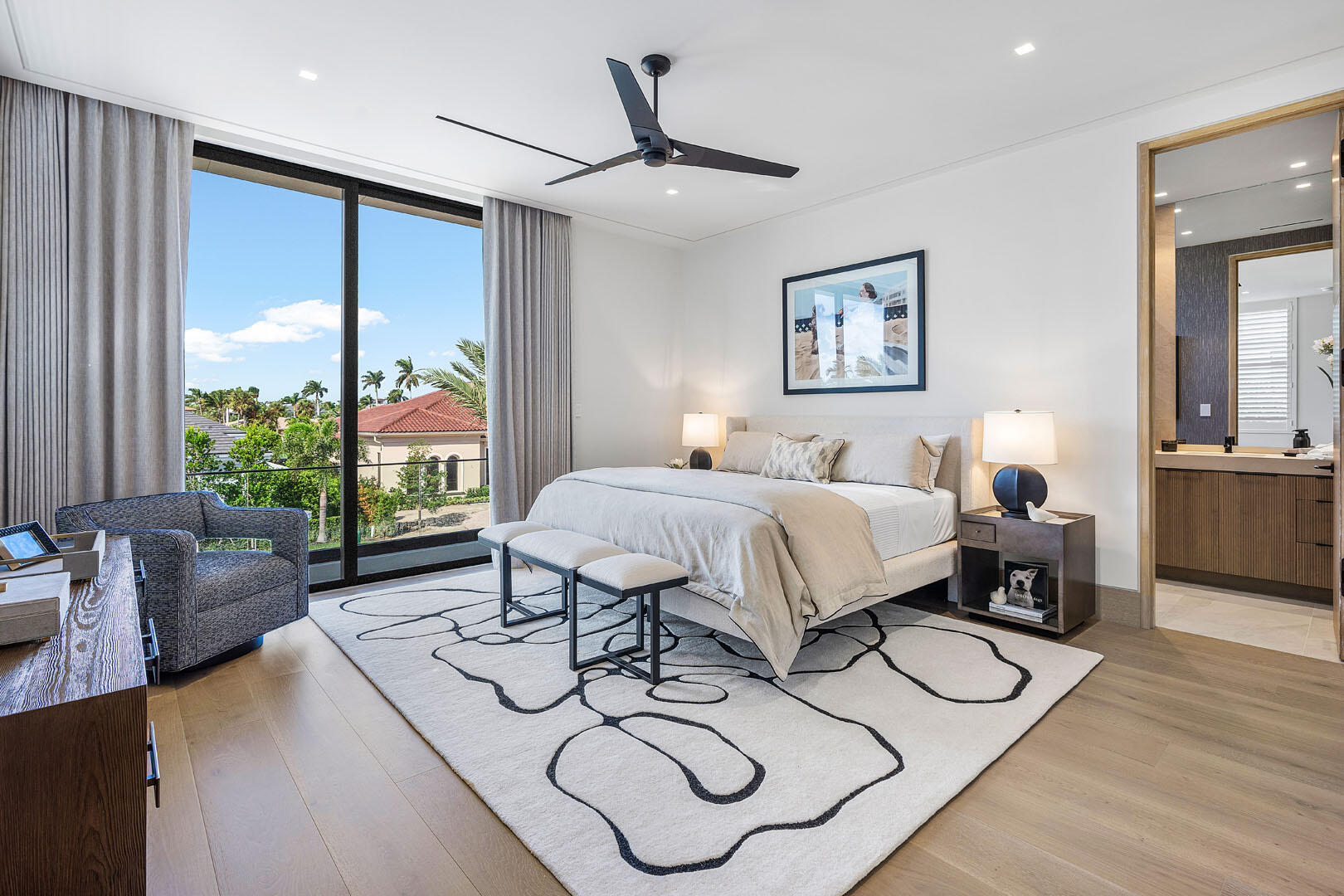 1520 Royal Palm Way Boca Raton, FL 33432 - Photo 71 of 100 a bedroom with a bed window and a table in it