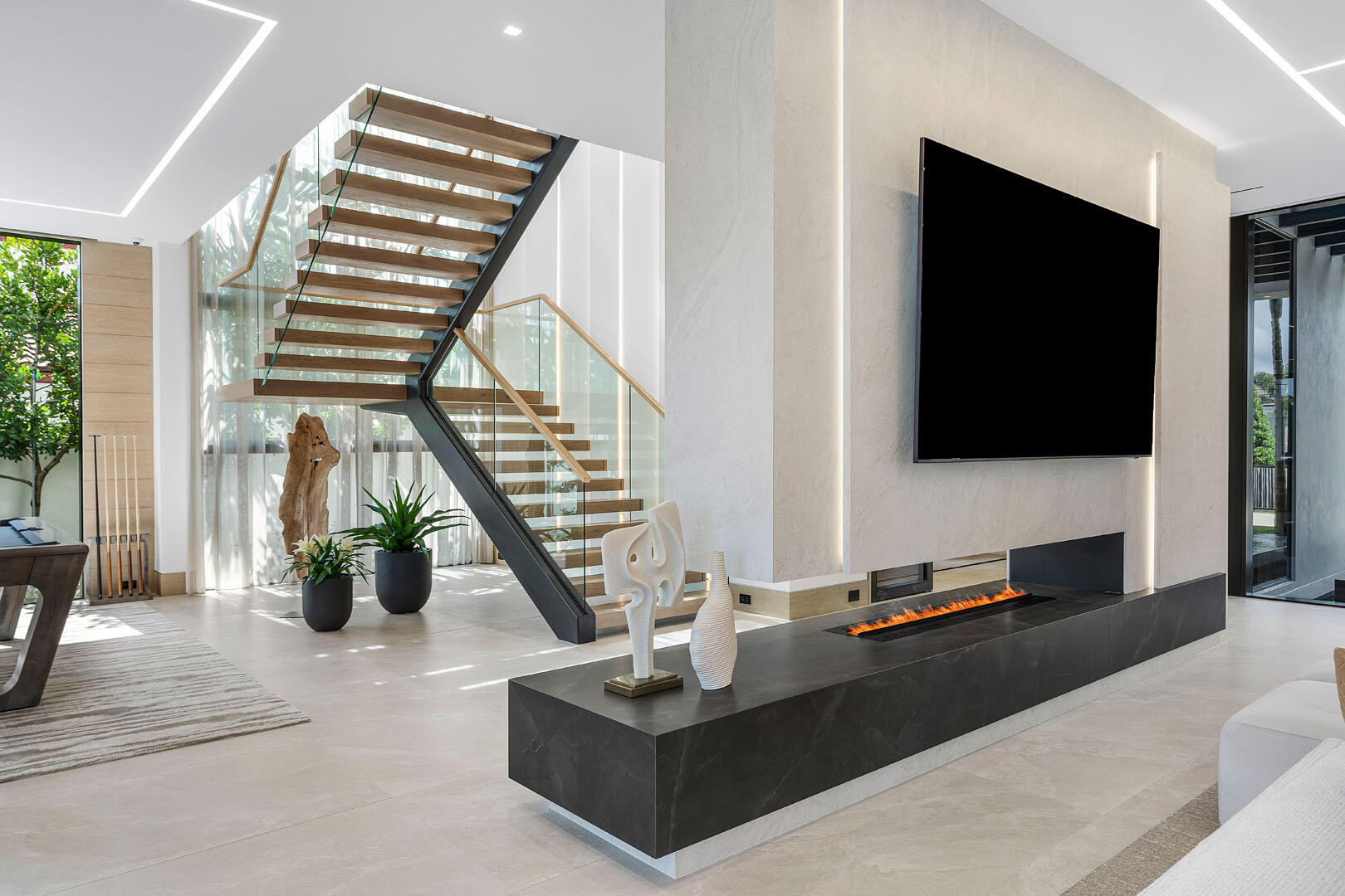 1520 Royal Palm Way Boca Raton, FL 33432 - Photo 10 of 100 a living room with couch and a flat screen tv