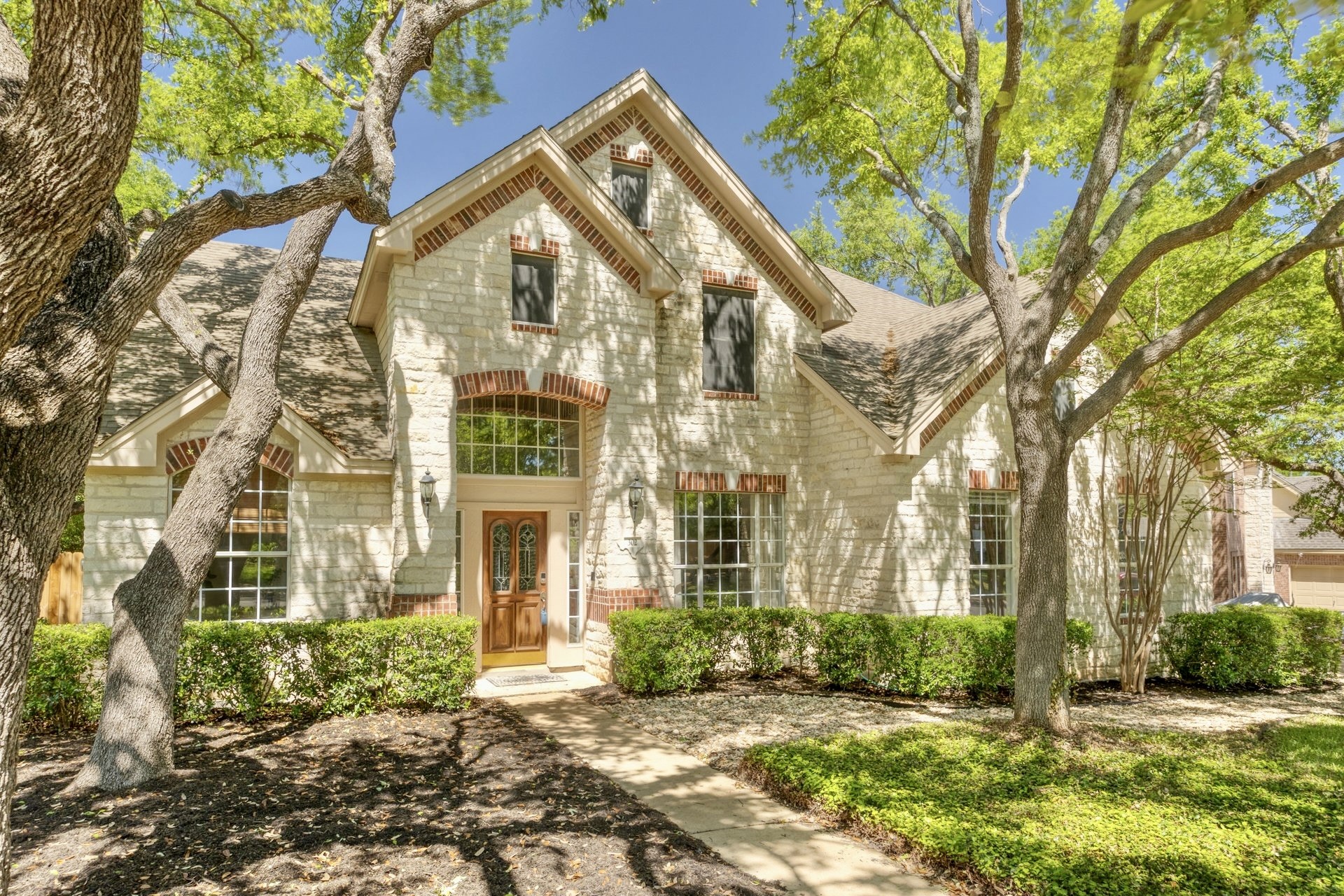 302 Rim Rock Drive Georgetown, TX 78628 - Photo 1 of 1 Welcome to this charming traditional 2 story stone and brick accents facade home nestled in a serene established neighborhood of River Ridge.