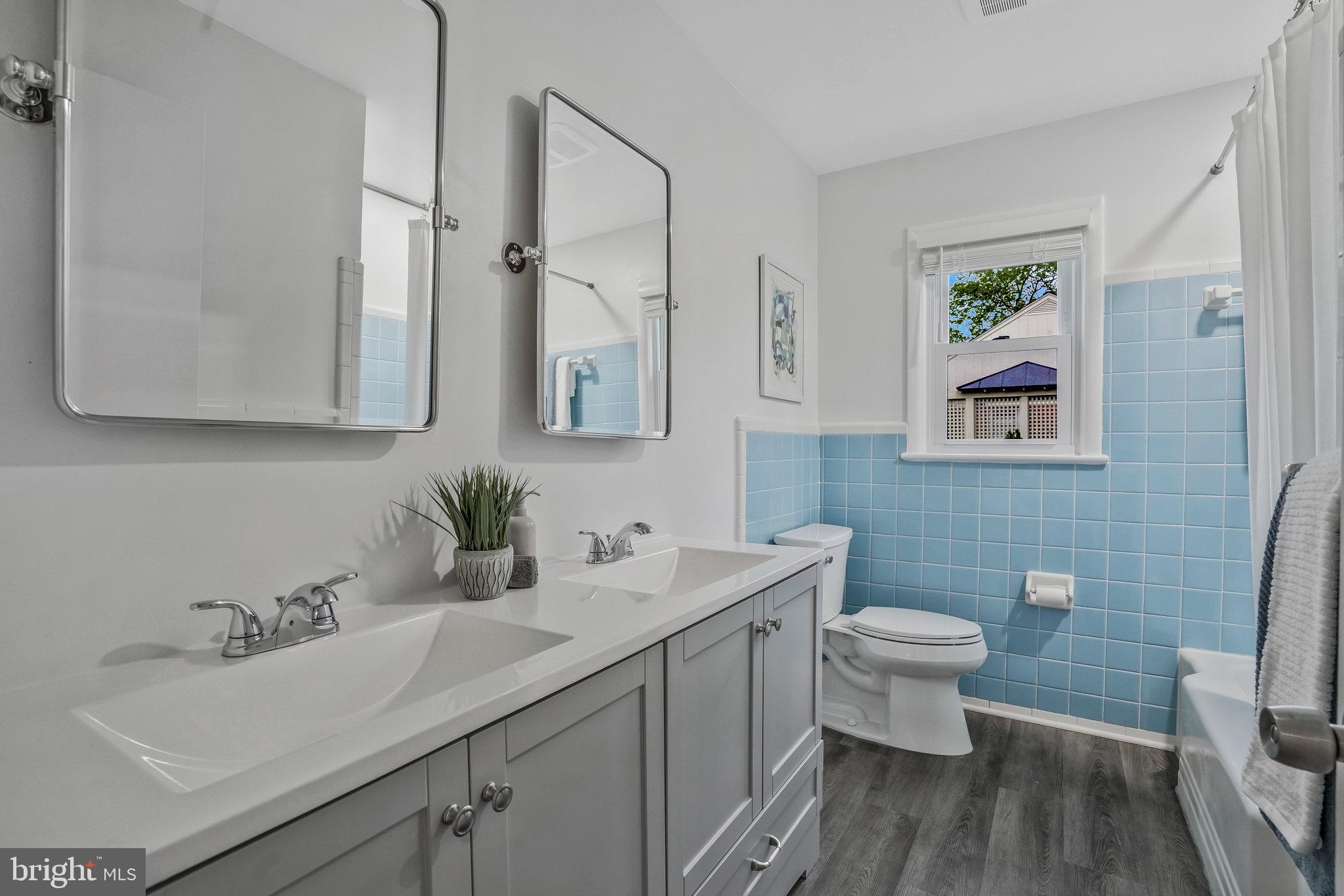 6436 Elmdale Road Alexandria, VA 22312 - Photo 19 of 46 Hallway bathroom w/double vanity + new mirrors