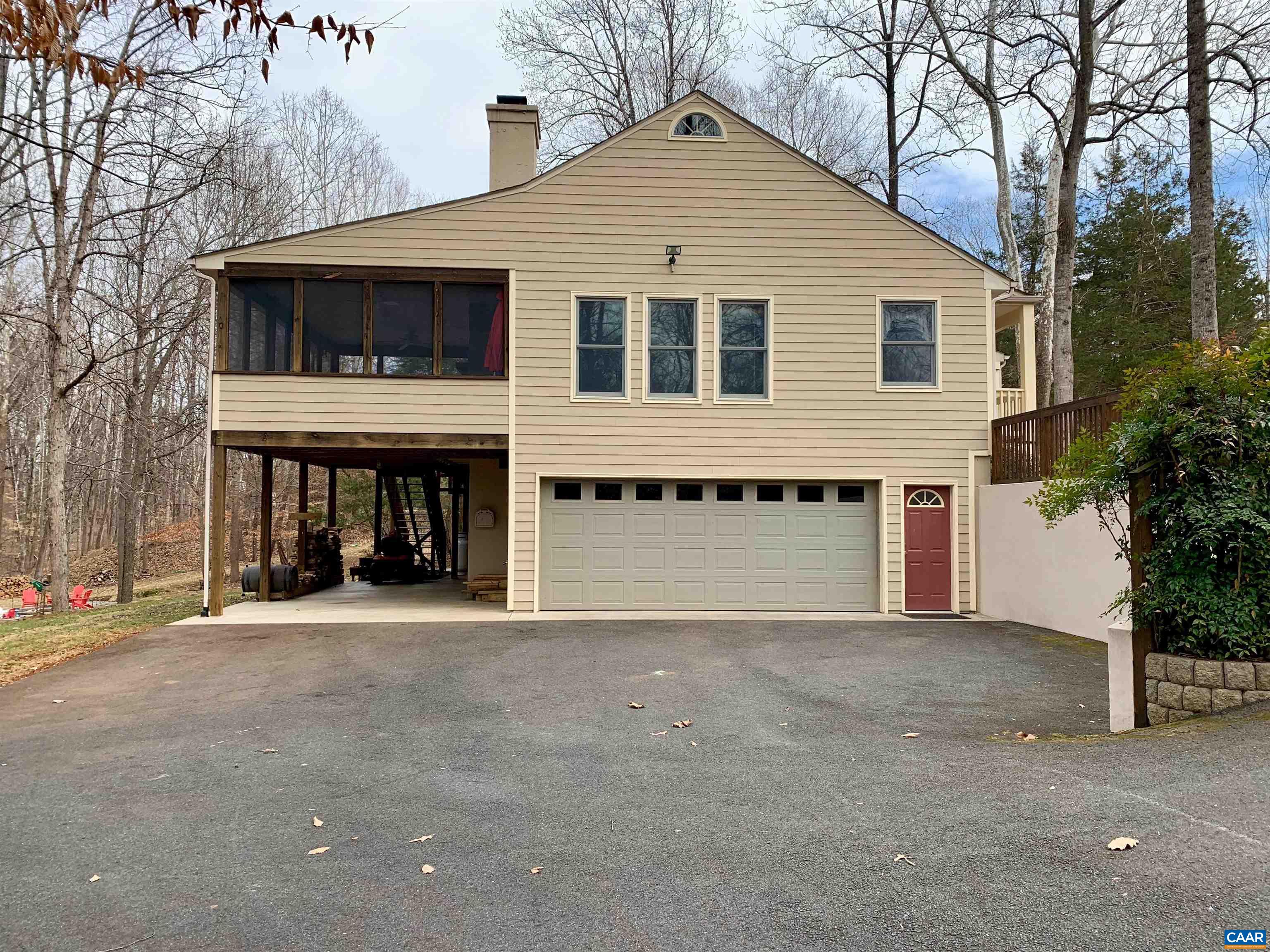 130 Ivy Ridge Road Charlottesville, VA 22901 - Photo 56 of 66 a view of a house with a yard and garage