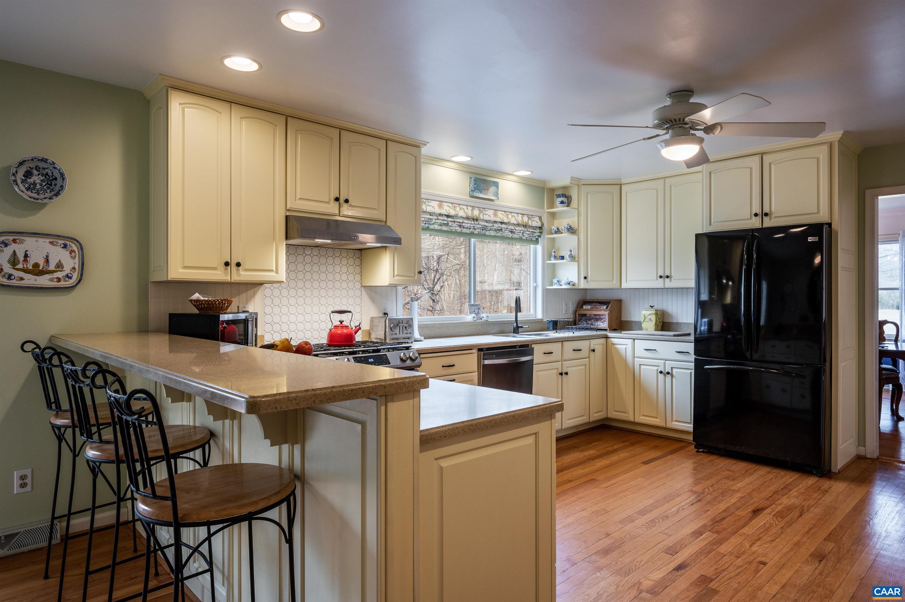 130 Ivy Ridge Road Charlottesville, VA 22901 - Photo 8 of 66 a kitchen that has a lot of cabinets in it and stainless steel appliances