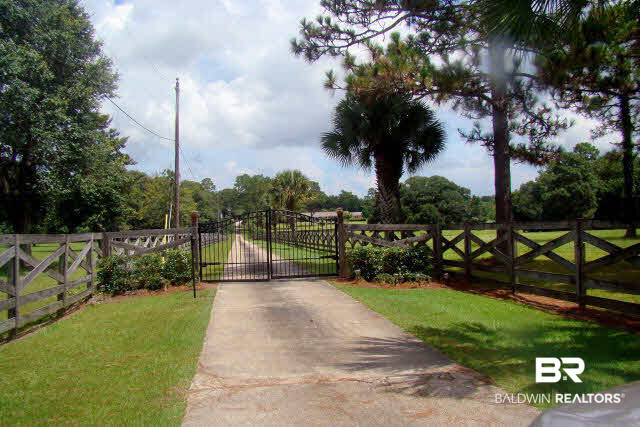 11035 Padgett Switch Road Irvington, AL 36544 - Photo 11 of 14 Gate entrance