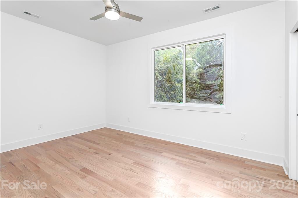3909 Plainview Road Charlotte, NC 28208 - Photo 12 of 24 an empty room with a window