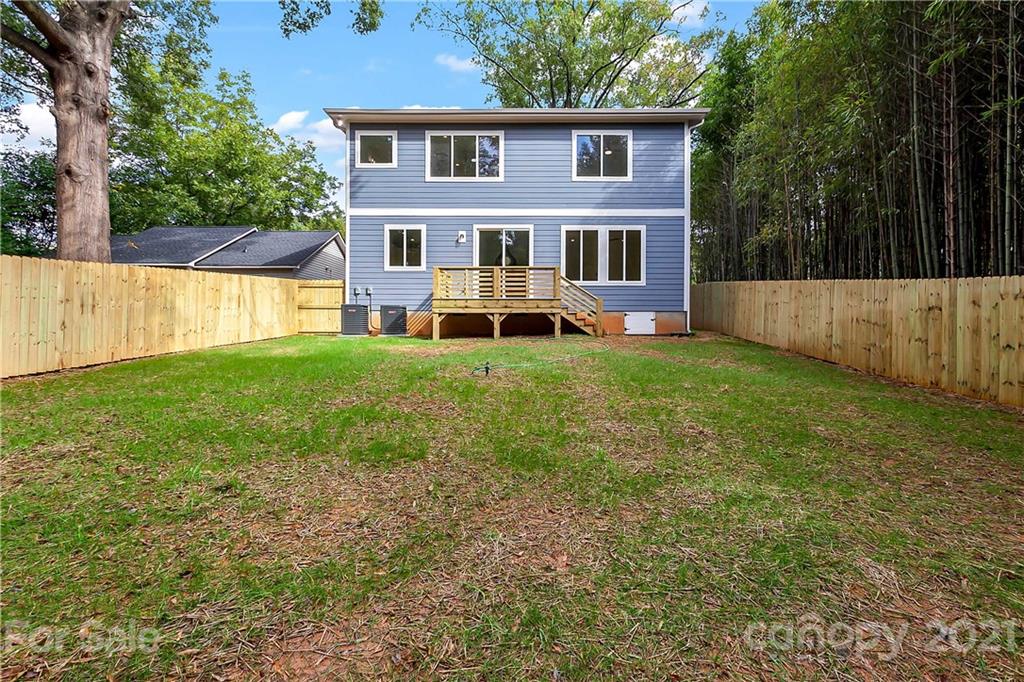 3909 Plainview Road Charlotte, NC 28208 - Photo 23 of 24 a view of a house with a yard