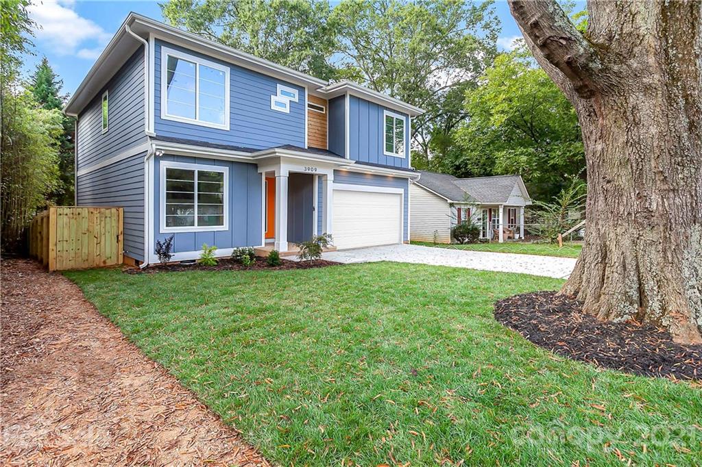 3909 Plainview Road Charlotte, NC 28208 - Photo 24 of 24 a front view of a house with a yard