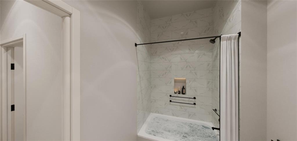 2600 Holcomb Bridge Road, Unit 2B Alpharetta, GA 30022 - Photo 17 of 21 a bathroom with a granite countertop shower