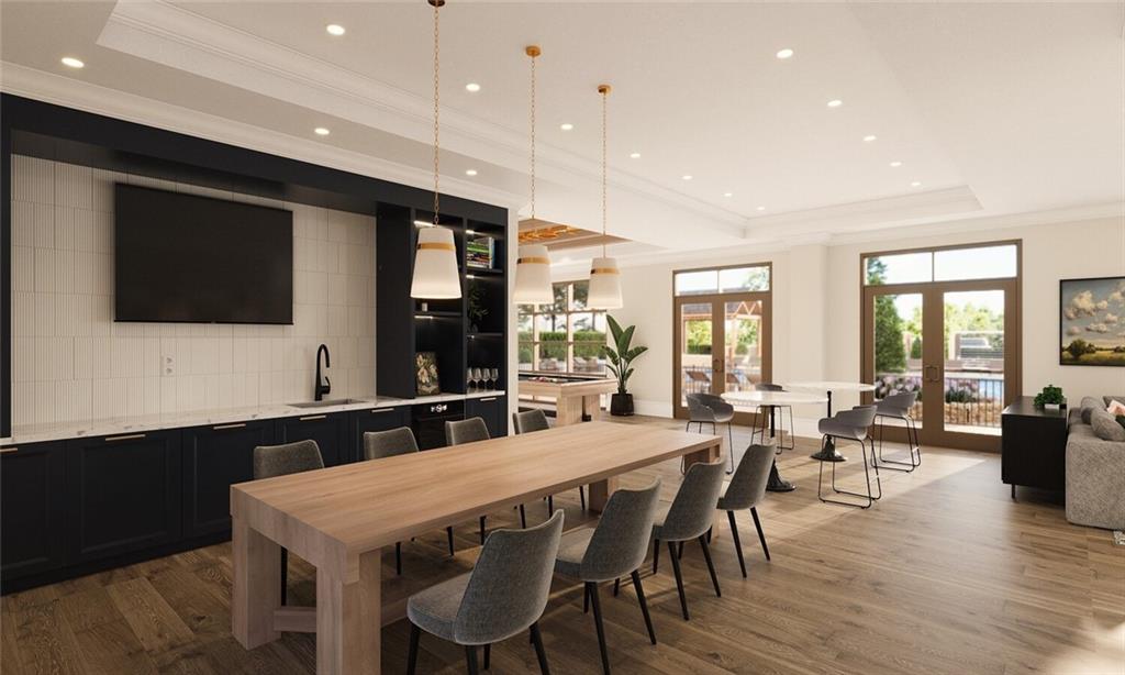 2600 Holcomb Bridge Road, Unit 2B Alpharetta, GA 30022 - Photo 6 of 21 a large kitchen with a table and chairs