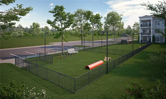 a view of a backyard with sitting area