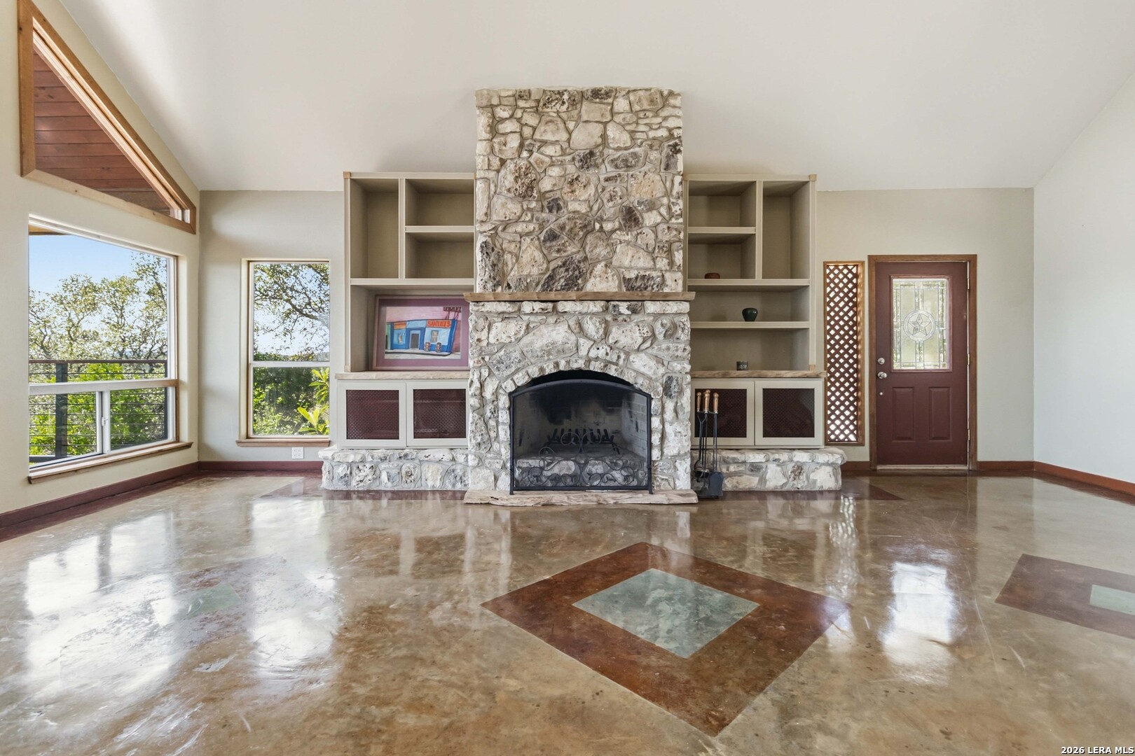 19708 Nottingham Lane Grey Forest, TX 78023 - Photo 14 of 67 a living room with fireplace windows and a fireplace
