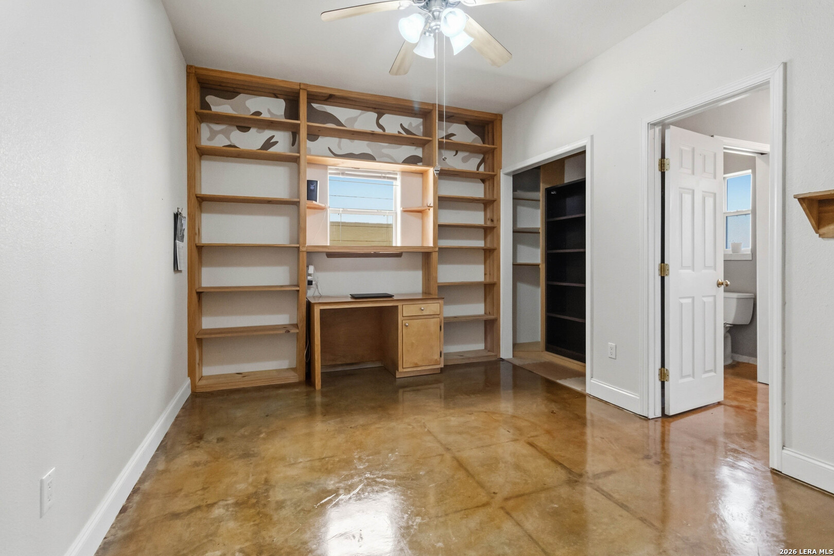 19708 Nottingham Lane Grey Forest, TX 78023 - Photo 38 of 67 a view of a room with a furniture and empty shelves