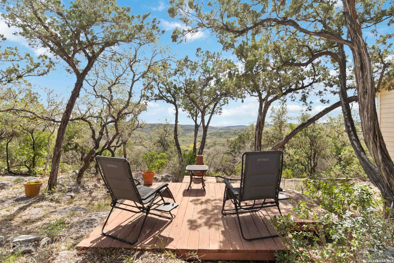19708 Nottingham Lane Grey Forest, TX 78023 - Photo 53 of 67 a view of backyard with sitting area