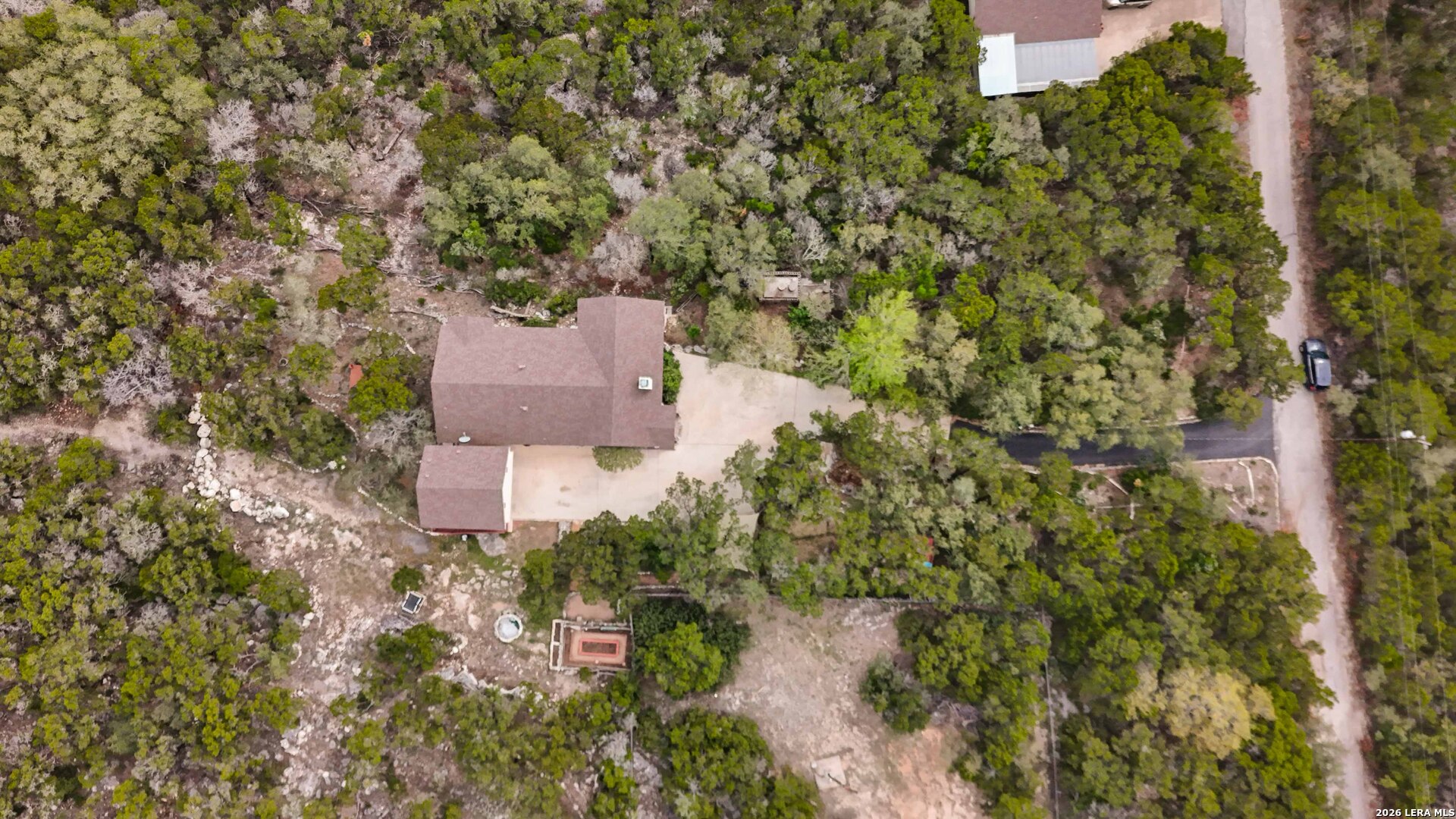 19708 Nottingham Lane Grey Forest, TX 78023 - Photo 64 of 67 an aerial view of a house with a yard