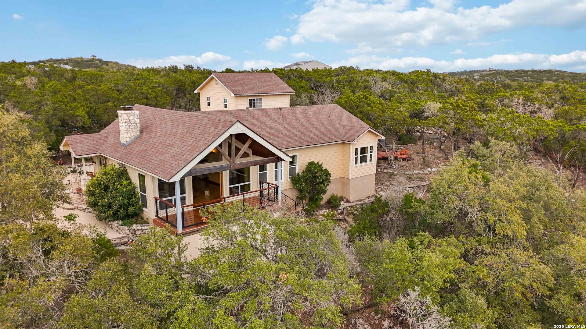 19708 Nottingham Lane Grey Forest, TX 78023 - Photo 8 of 67 a aerial view of a house with a big yard and large trees