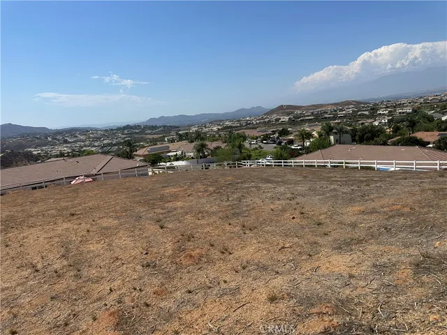 a view of a road with an ocean