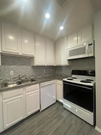 a close view of a stove and washer