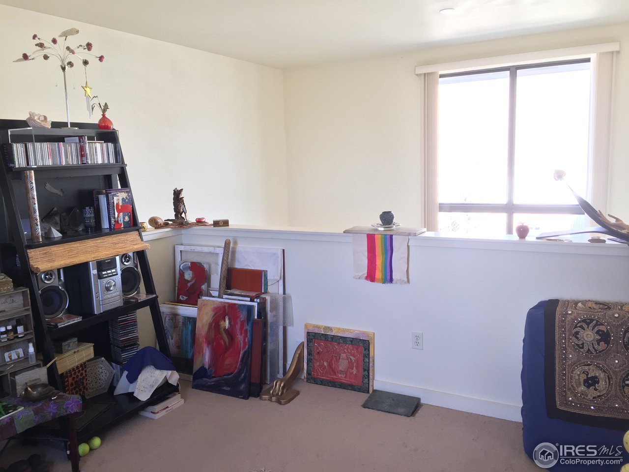 4645 Broadway, Unit C2 Boulder, CO 80304 - Photo 14 of 20 a living room with baby toys