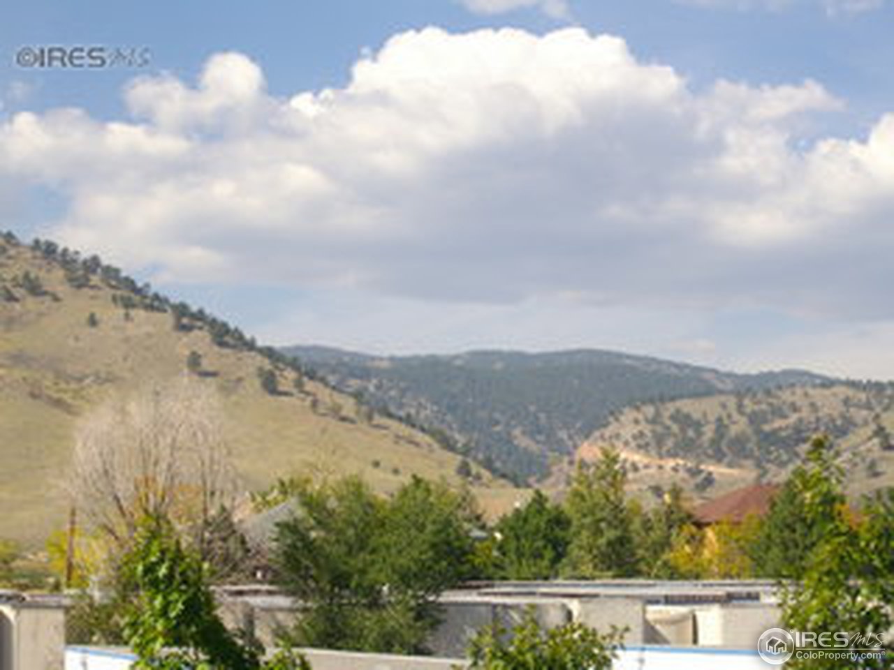 4645 Broadway, Unit C2 Boulder, CO 80304 - Photo 18 of 20 a view of mountain with lake