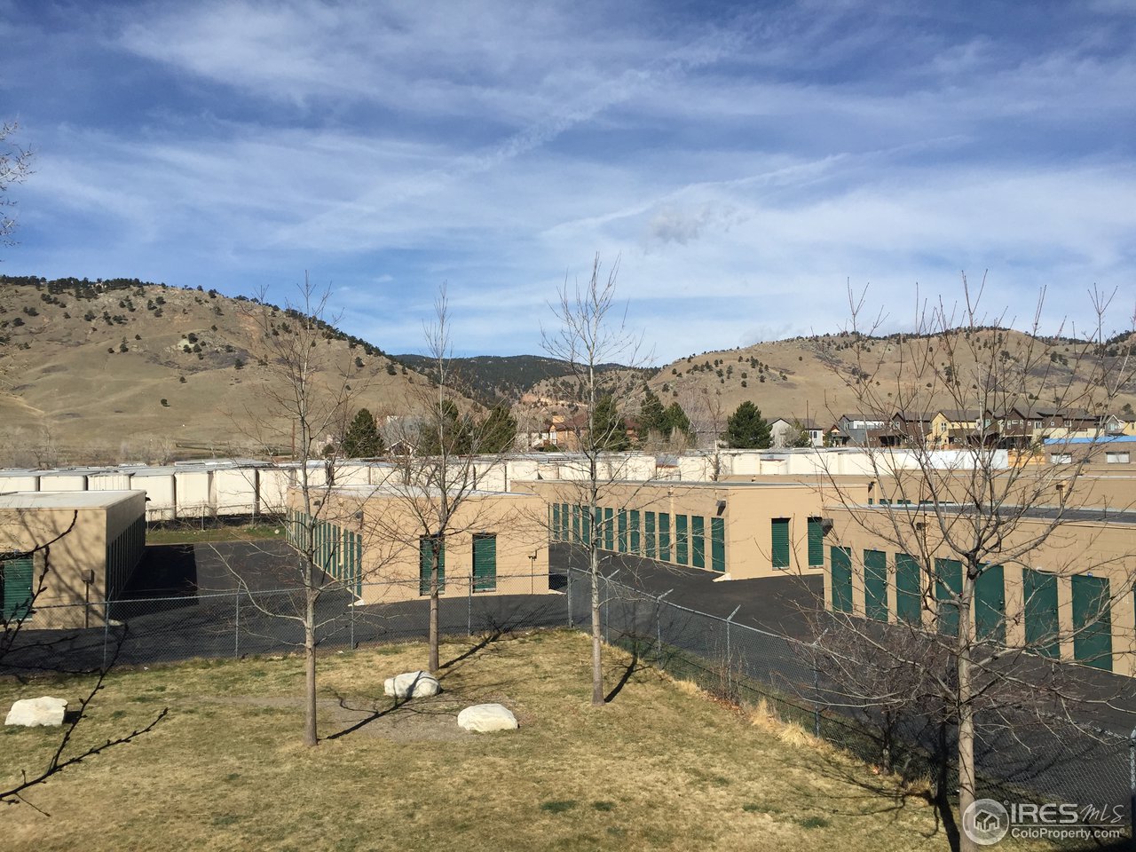 4645 Broadway, Unit C2 Boulder, CO 80304 - Photo 19 of 20 a view of a building with a yard