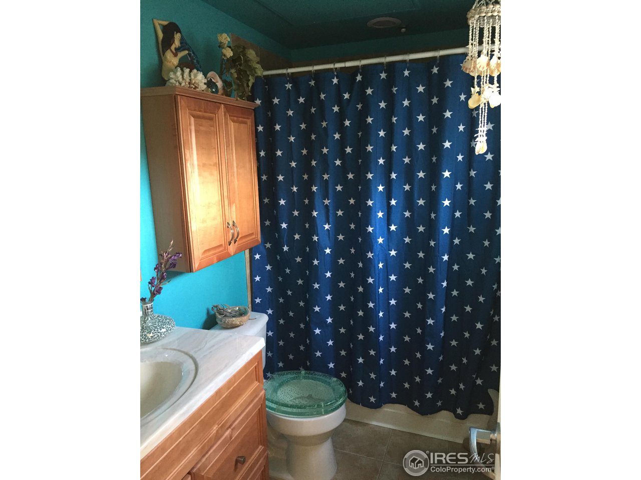 4645 Broadway, Unit C2 Boulder, CO 80304 - Photo 10 of 20 a bathroom with a sink toilet and shower