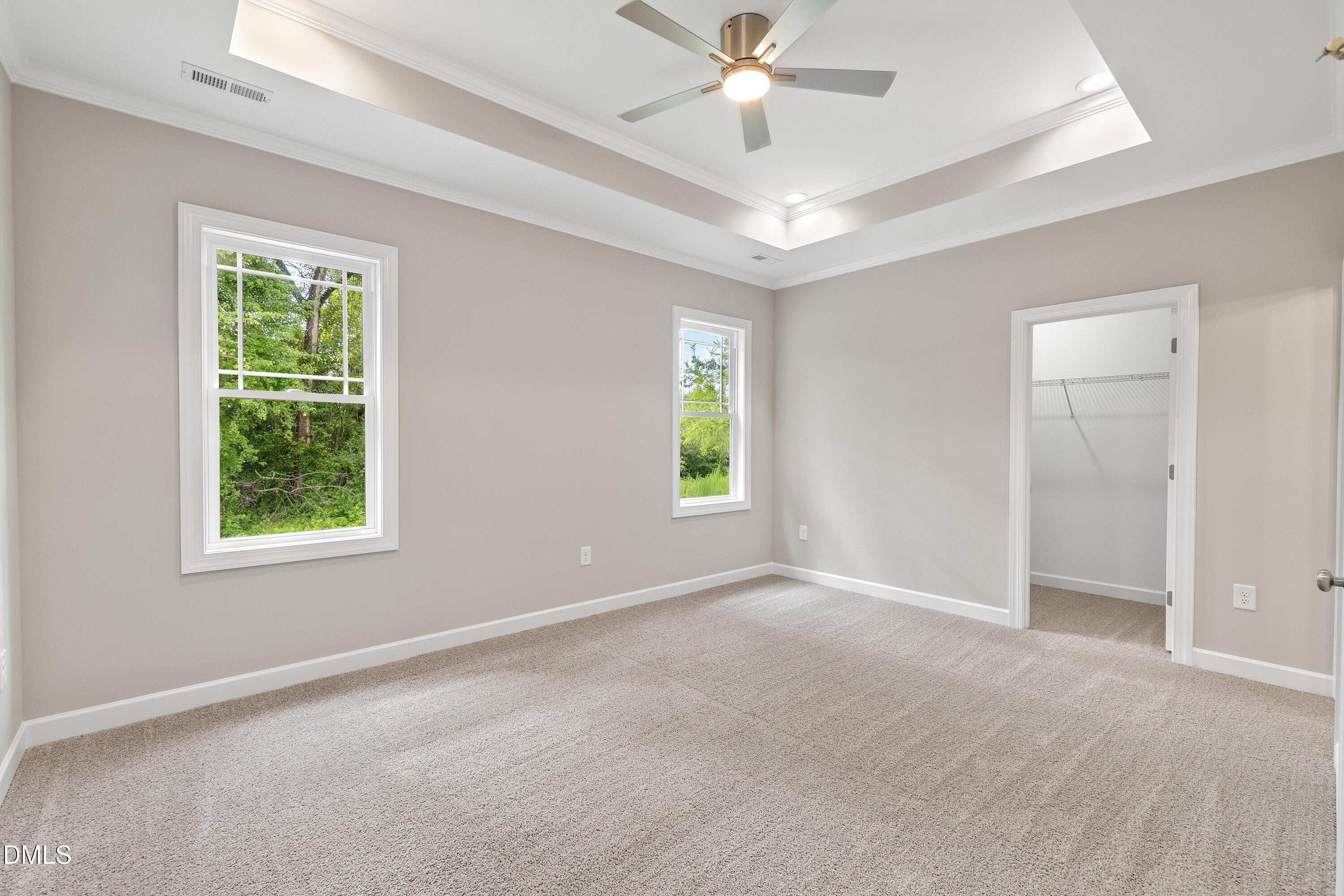 1115 Nor-Am Road Pikeville, NC 27863 - Photo 25 of 40 an empty room with a window and a fan