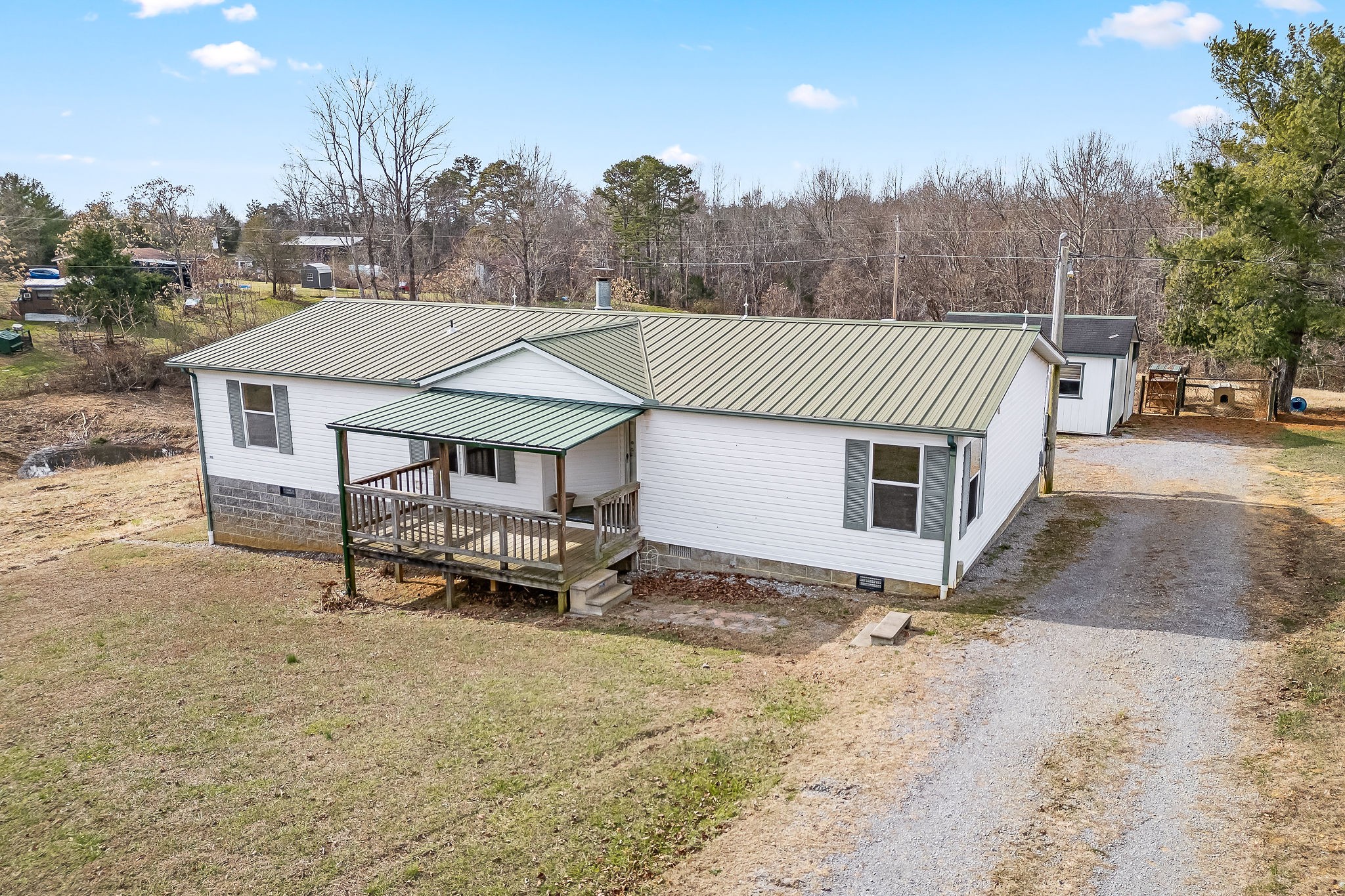 365 Poss Road Smithville, TN 37166 - Photo 3 of 20 a aerial view of a house with a yard and sitting area