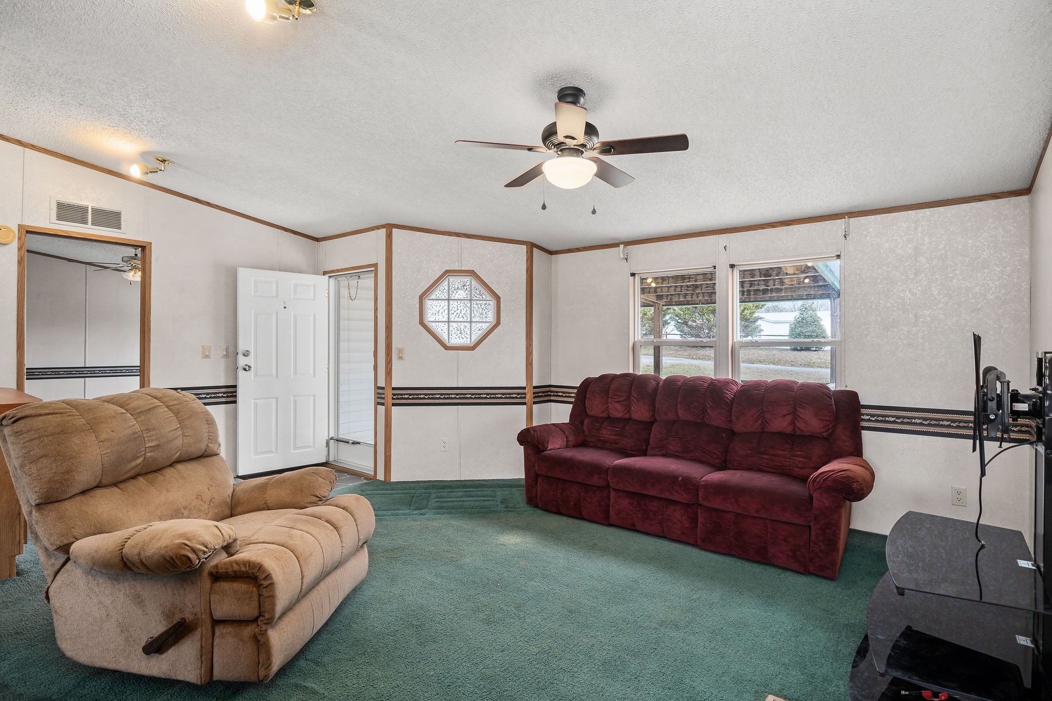 365 Poss Road Smithville, TN 37166 - Photo 8 of 20 a living room with furniture and a window