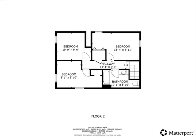 a picture of a bench in front of a wall