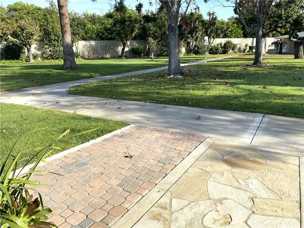 a view of a backyard with green space