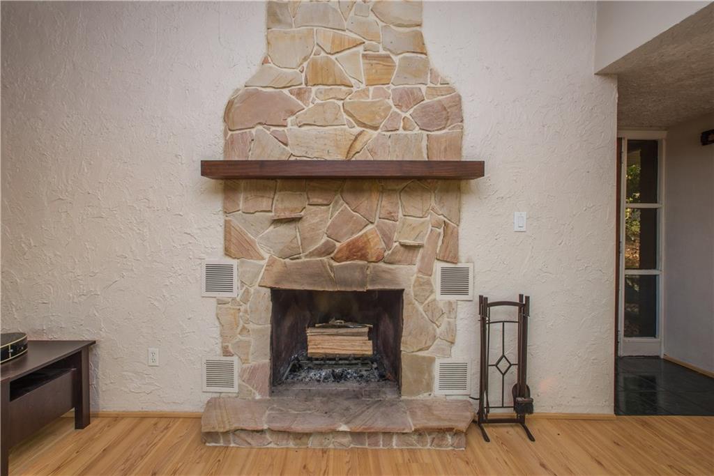 39 Buckhill Road Pittsburgh, PA 15237 - Photo 15 of 25 A stone fireplace creates a warm environment on the cold winter nights.