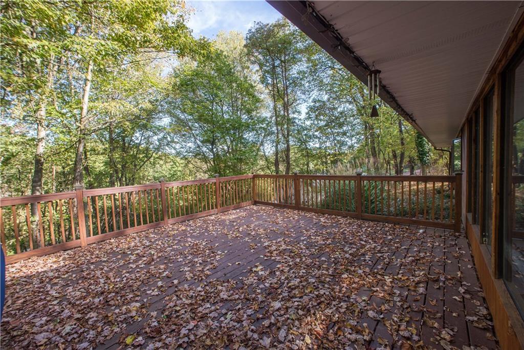 39 Buckhill Road Pittsburgh, PA 15237 - Photo 23 of 25 Enjoy a view of the tree lined yard as you relax on the deck.