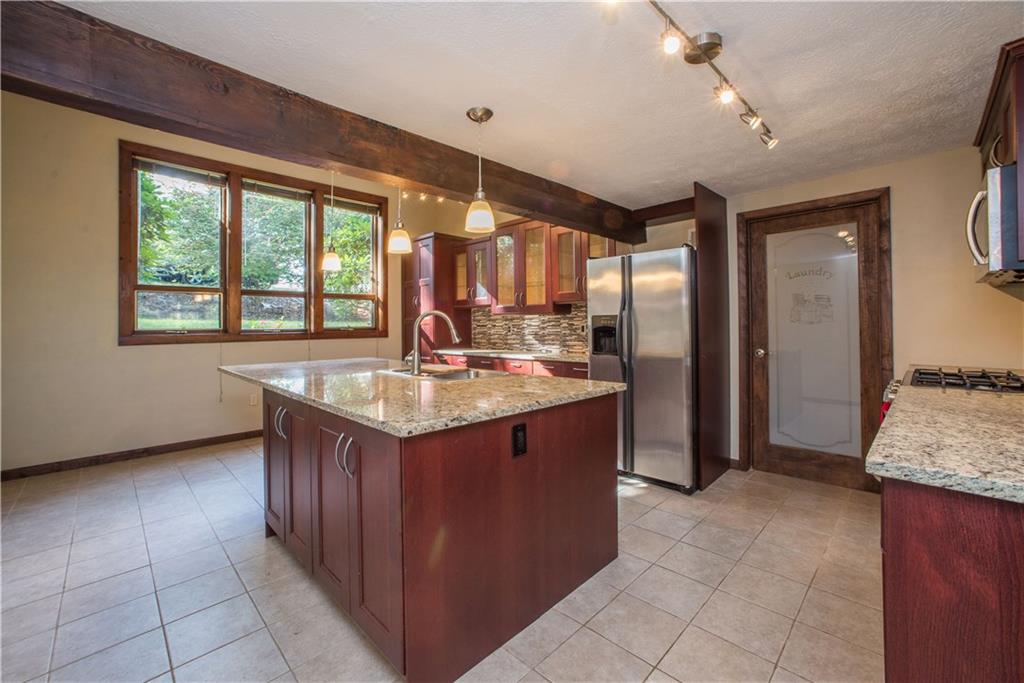 39 Buckhill Road Pittsburgh, PA 15237 - Photo 7 of 25 The laundry room is conveniently placed directly off the kitchen.