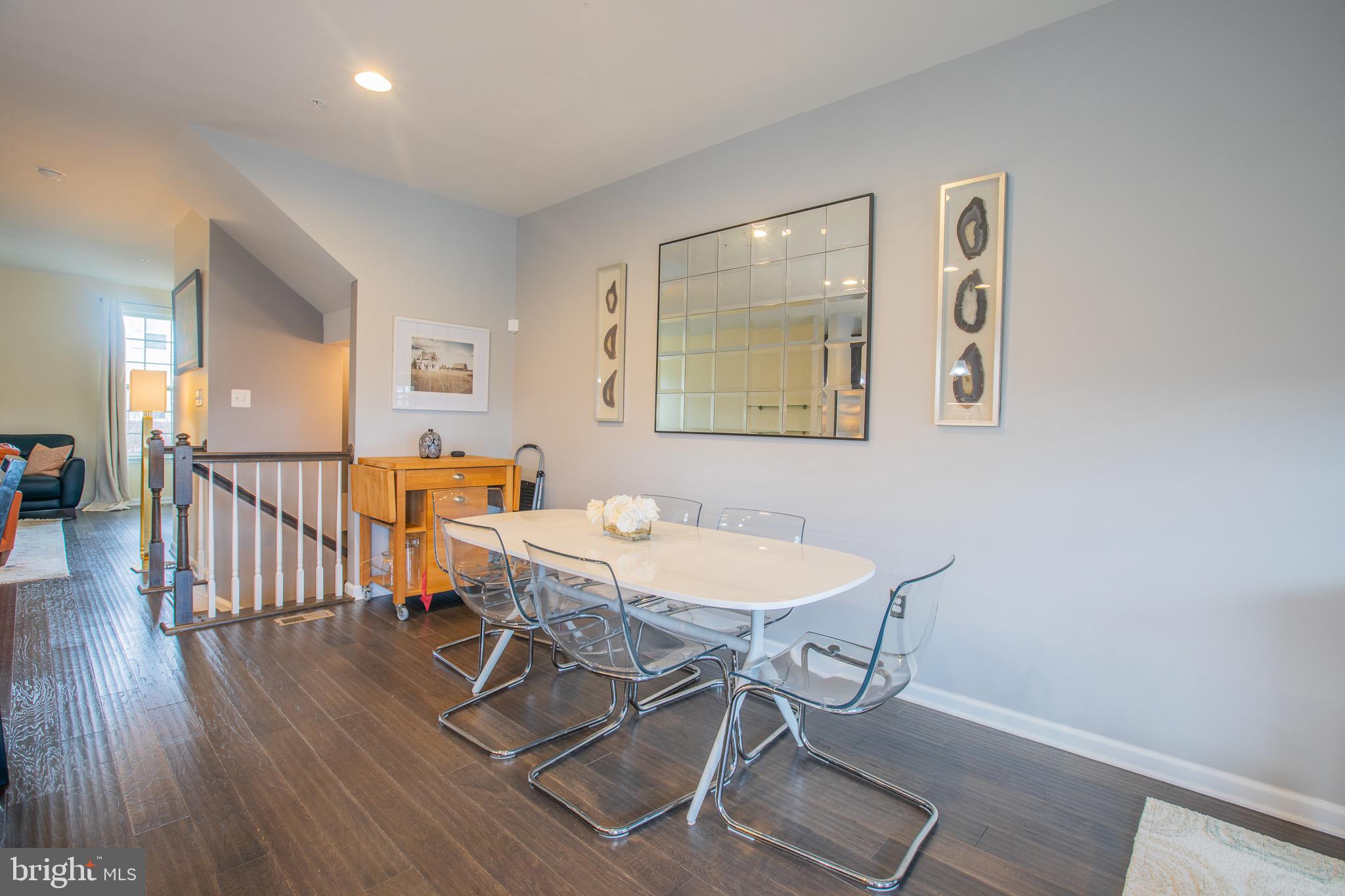 2608 Fiat Drive Hanover, MD 21076 - Photo 13 of 39 a view of a dining room with furniture and wooden floor