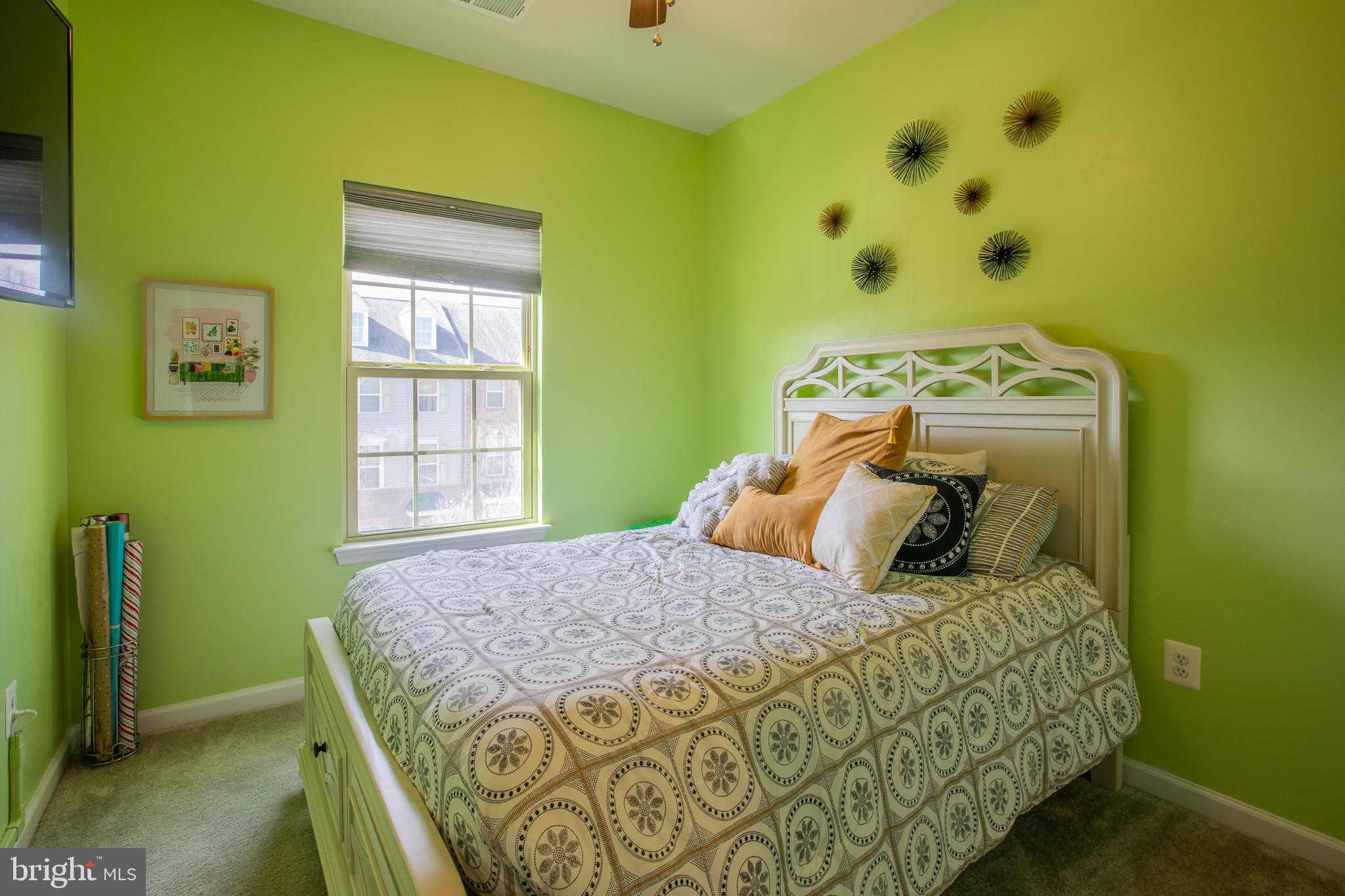 2608 Fiat Drive Hanover, MD 21076 - Photo 23 of 39 a bedroom with a bed and a window