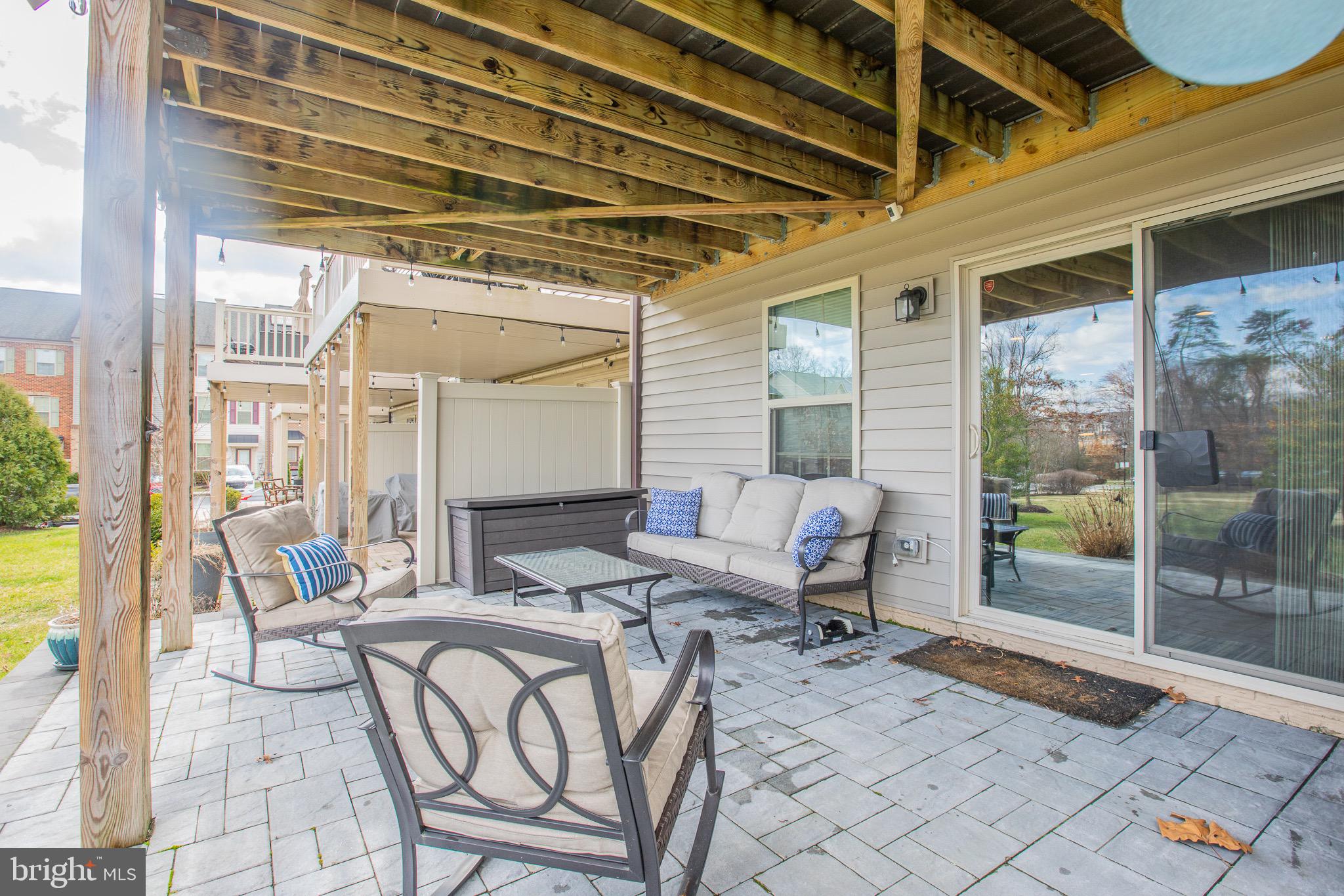 2608 Fiat Drive Hanover, MD 21076 - Photo 36 of 39 a living room with furniture and a floor to ceiling window