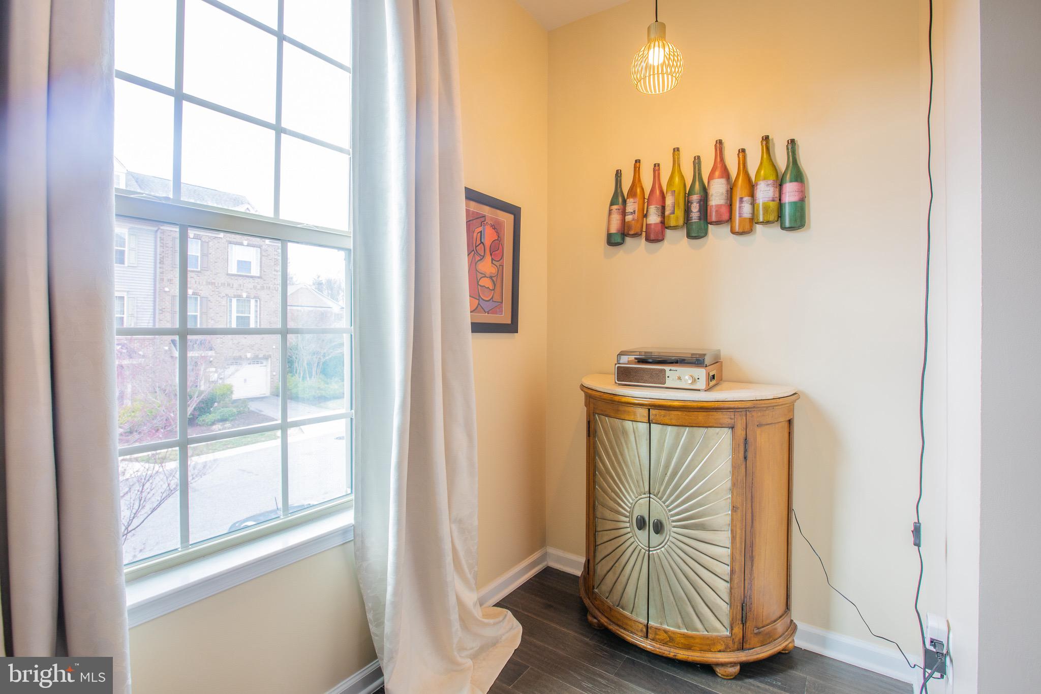 2608 Fiat Drive Hanover, MD 21076 - Photo 9 of 39 a room with a window and a chandelier