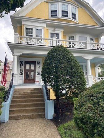 52 Powder House Boulevard, Unit 1 Somerville, MA 02144 - Photo 2 of 30 a front view of a house
