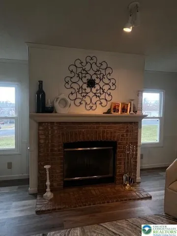 a fireplace with wooden floor