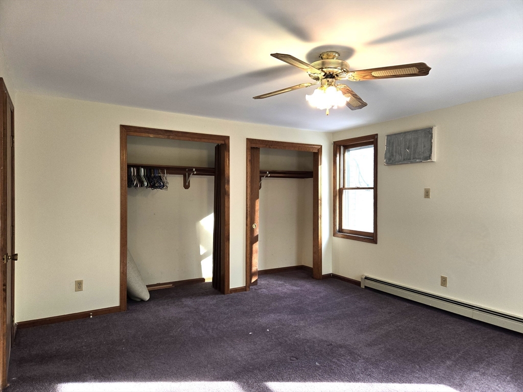 1170 Wilson Road, Unit 1 Fall River, MA 02720 - Photo 12 of 25 an empty room with fan and windows