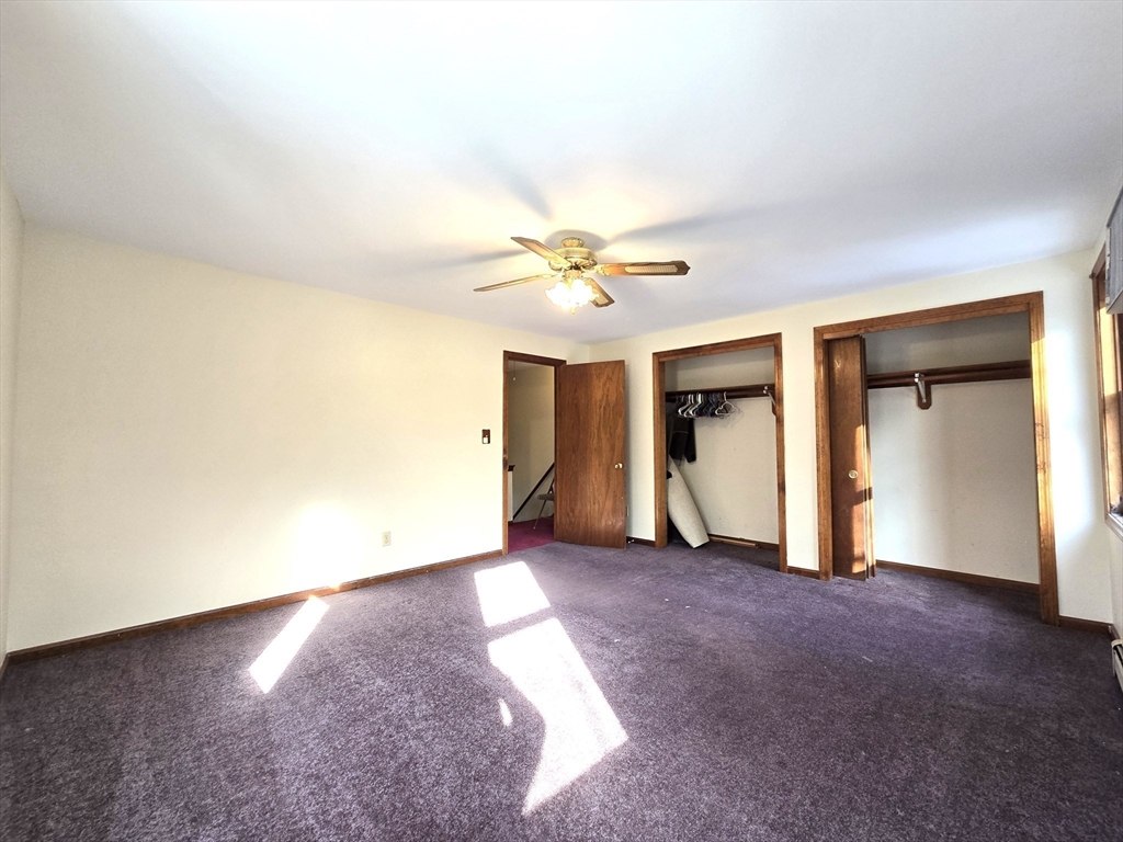 1170 Wilson Road, Unit 1 Fall River, MA 02720 - Photo 14 of 25 a view of a livingroom with a ceiling fan and window