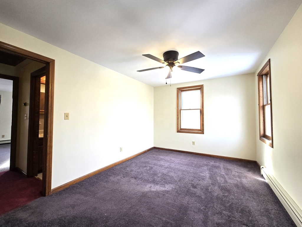 1170 Wilson Road, Unit 1 Fall River, MA 02720 - Photo 19 of 25 a view of an empty room with a window
