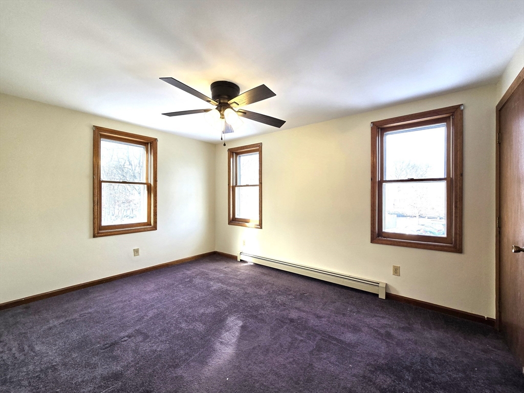 1170 Wilson Road, Unit 1 Fall River, MA 02720 - Photo 20 of 25 a view of an empty room with a window
